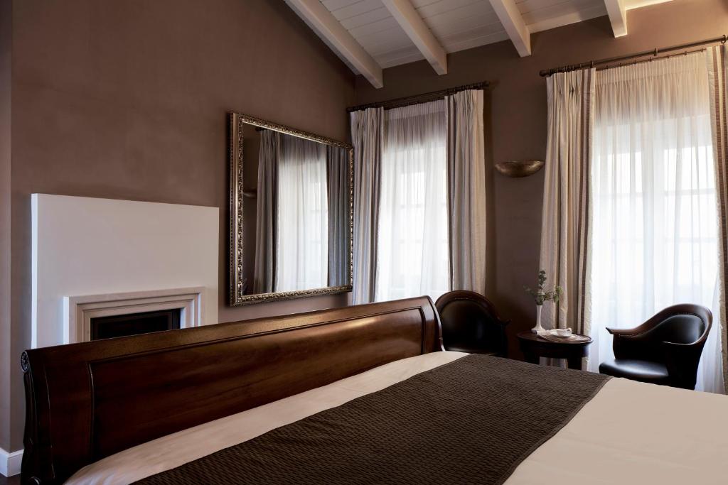 Postel nebo postele na pokoji v ubytování Hotel Ippoliti