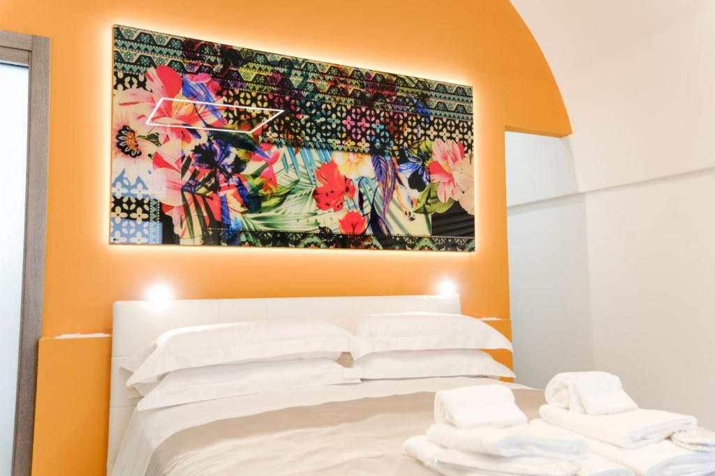 Postel nebo postele na pokoji v ubytování Ostuni Luxury Room