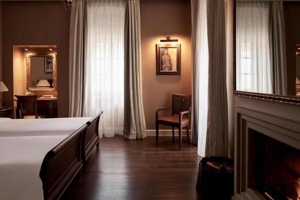 Postel nebo postele na pokoji v ubytování Hotel Ippoliti