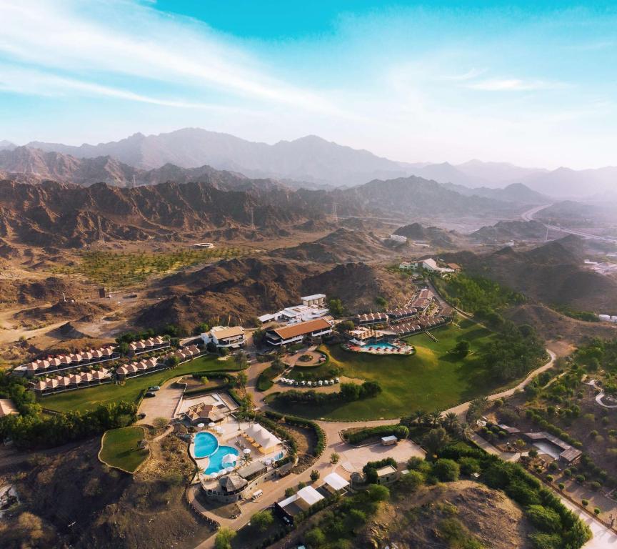 an aerial view of a resort in the mountains at JA Hatta Fort Hotel in Hatta