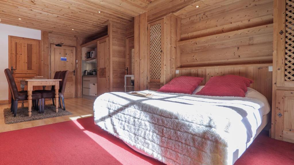 Postel nebo postele na pokoji v ubytování Hôtel Le Labrador