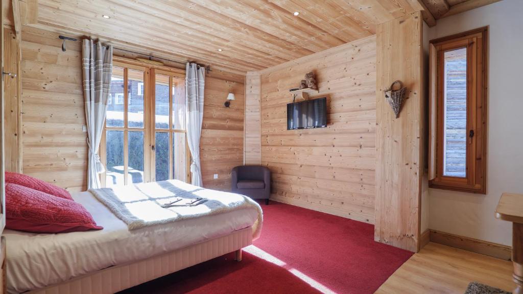 Postel nebo postele na pokoji v ubytování Hôtel Le Labrador