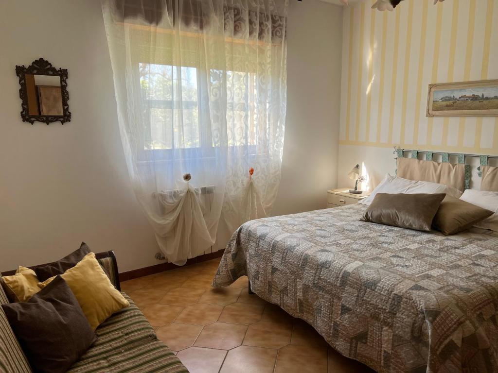 Postel nebo postele na pokoji v ubytování Casa vacanze La Via del Mare