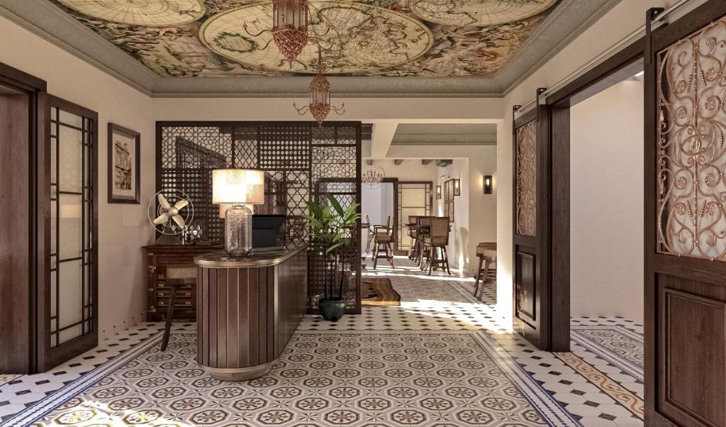 a hallway with a tile floor and a ceiling at Eileen Hotel Cairo in Cairo