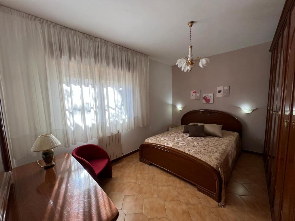 Postel nebo postele na pokoji v ubytování Casa vacanze La Via del Mare