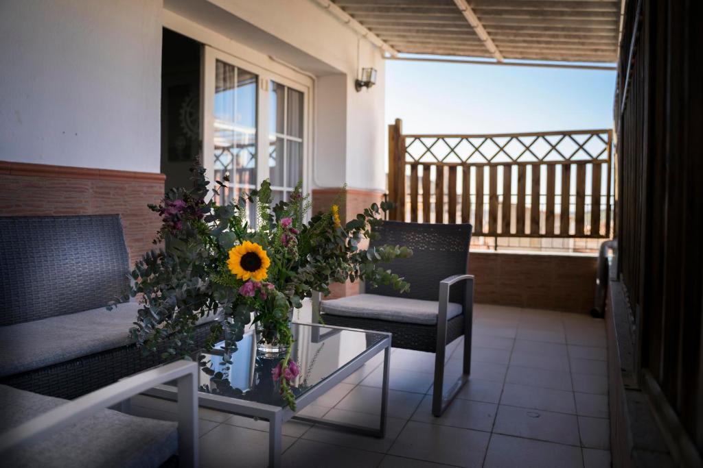 Un balcón o terraza de Hostal Goyesco Plaza