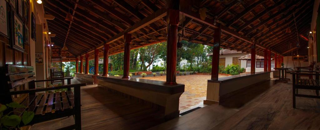 Posezení v ubytování Kudajadri Drizzle Homestay