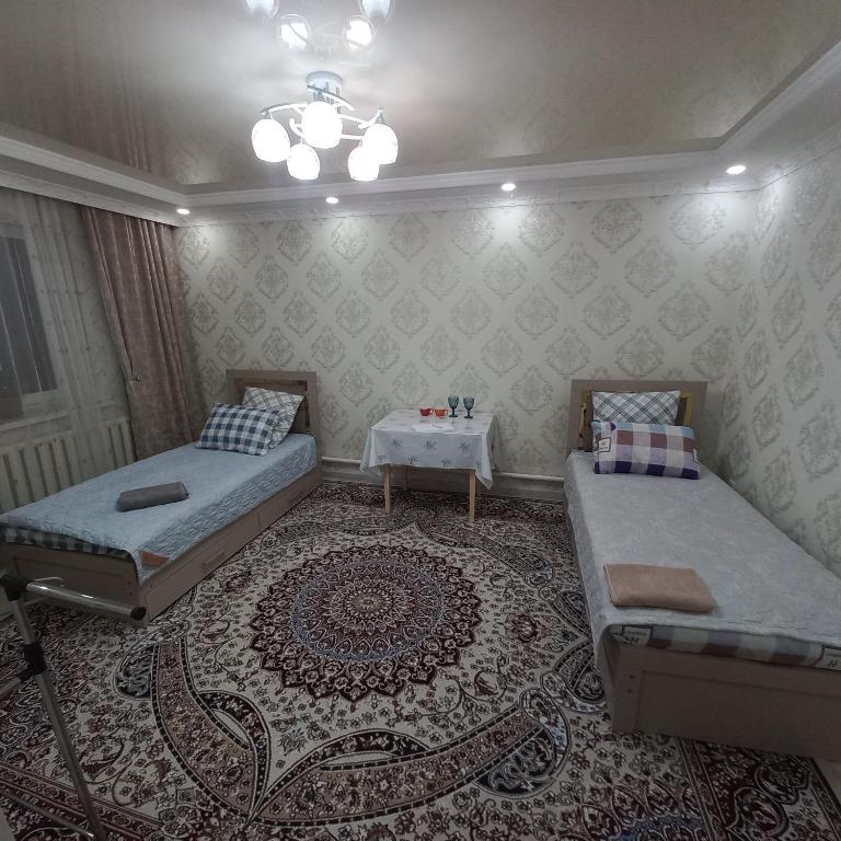 Postel nebo postele na pokoji v ubytování Hotel "Тихий Дом Трансфер"