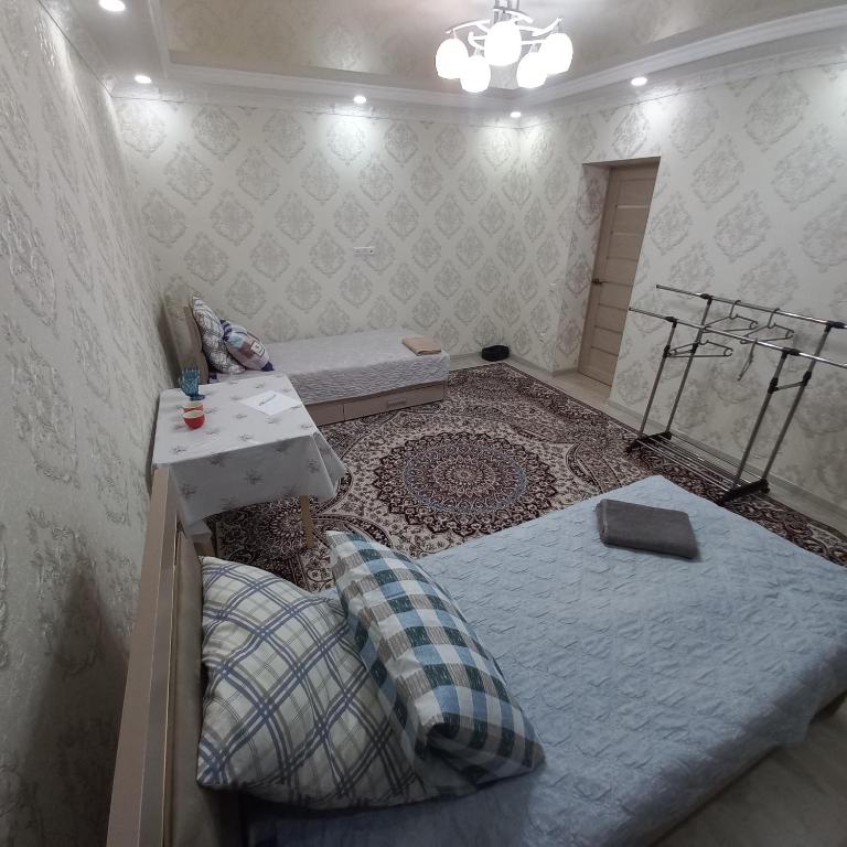 Postel nebo postele na pokoji v ubytování Hotel "Тихий Дом Трансфер"