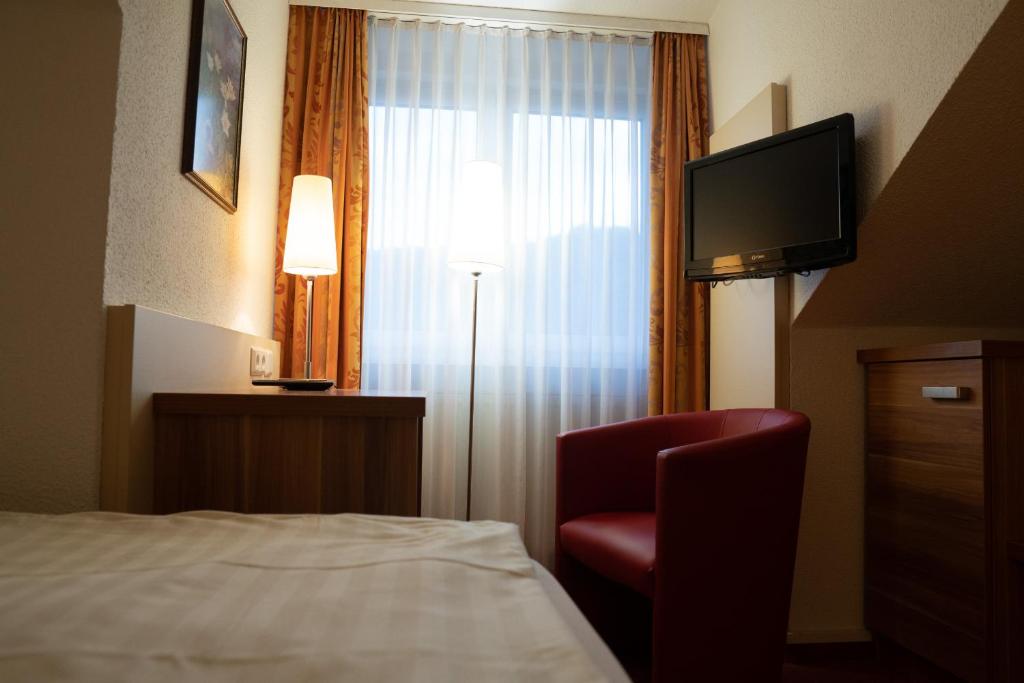 TV a/nebo společenská místnost v ubytování Hotel Jägerhof