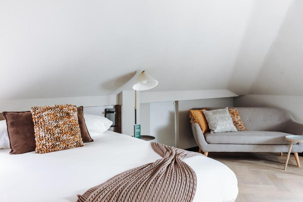 Postel nebo postele na pokoji v ubytování Havendijk Hotel