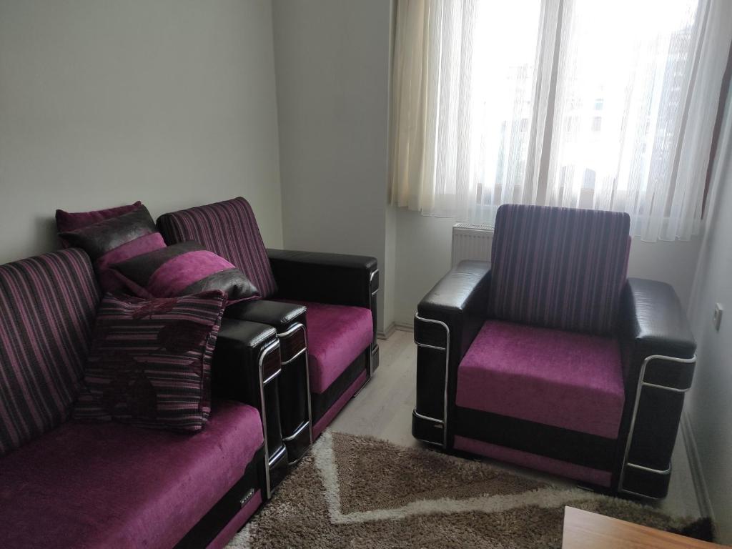 a living room with two chairs and a couch at Private Room in Istanbul #51 in Tuzla