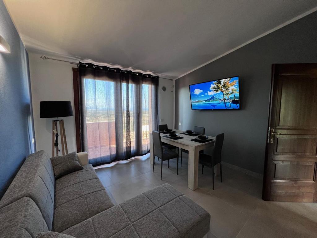 Telewizja i/lub zestaw kina domowego w obiekcie Calypso Home Sea View