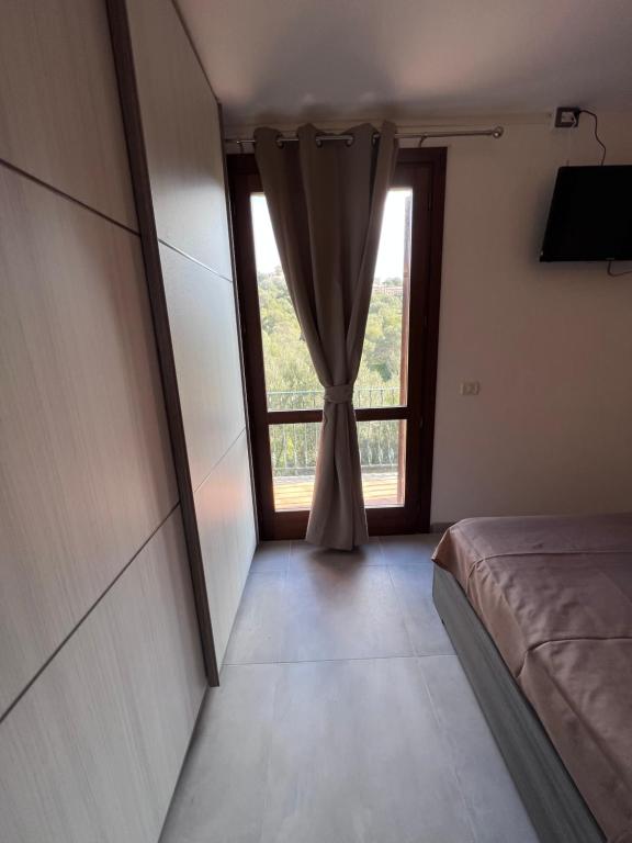 Łóżko lub łóżka w pokoju w obiekcie Calypso Home Sea View