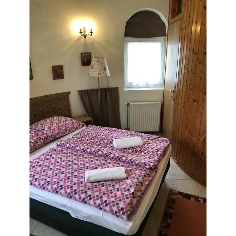Postel nebo postele na pokoji v ubytování Hotel Balaton Fonyód