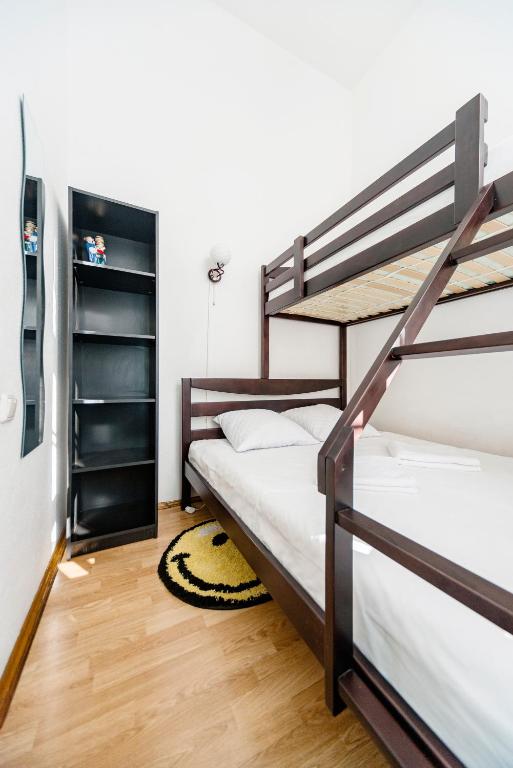 Postel nebo postele na pokoji v ubytování Muzey Hostel
