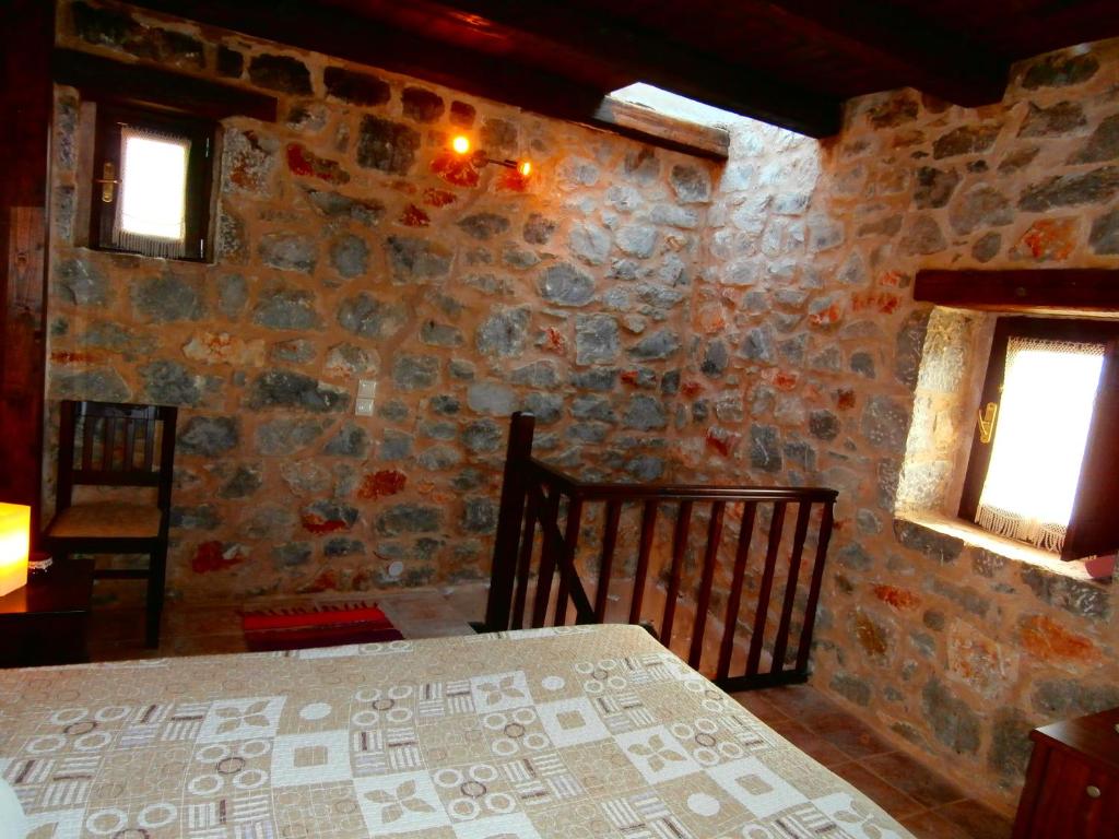Postel nebo postele na pokoji v ubytování Pirgoi Edem