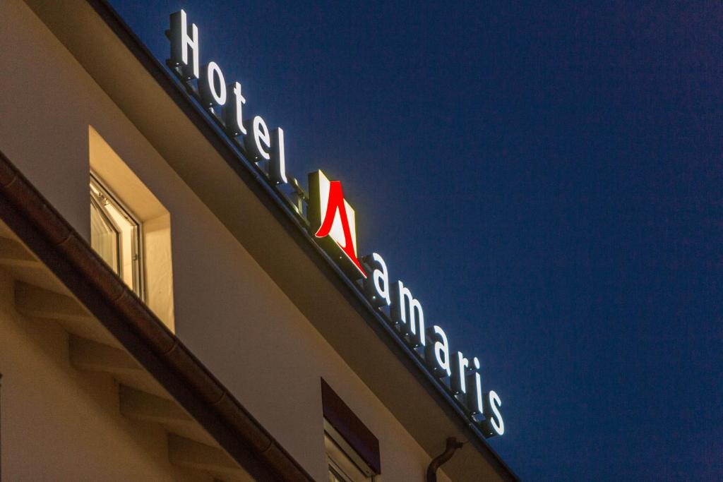 Certificado, premio, señal o documento que está expuesto en Hotel Amaris