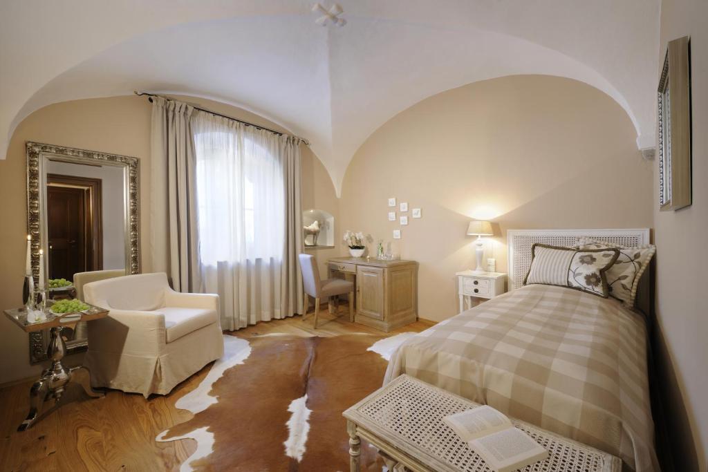 Postel nebo postele na pokoji v ubytování Hotel Gut Ising