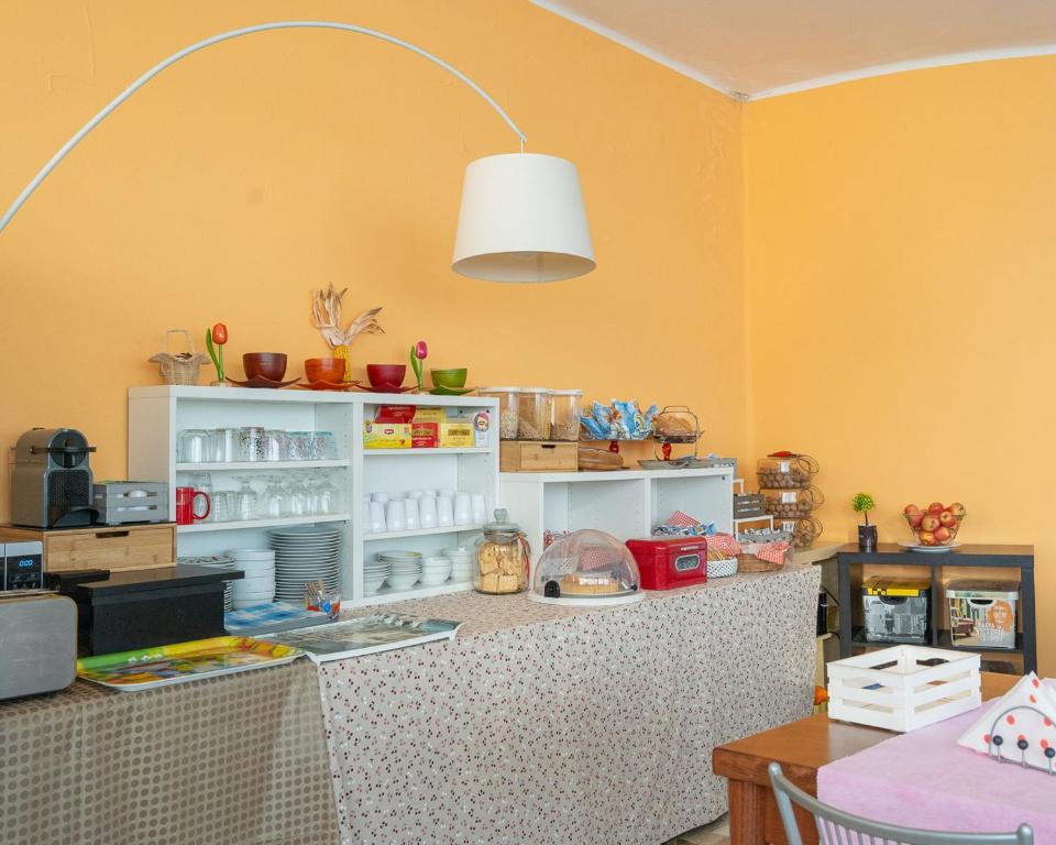 Kuchyň nebo kuchyňský kout v ubytování Hotel all'Oasi
