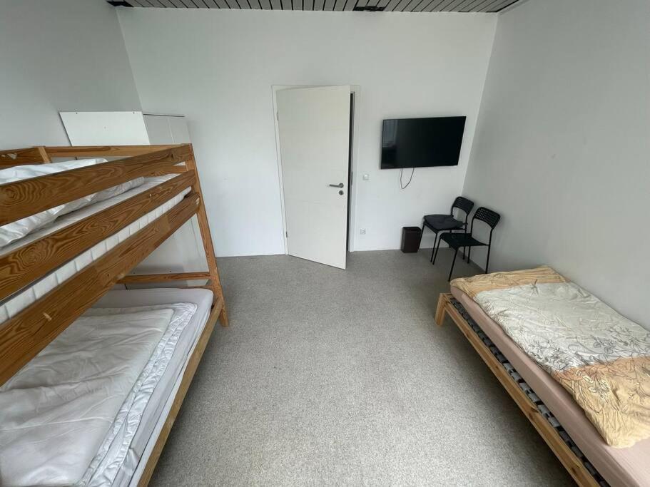 Postel nebo postele na pokoji v ubytování Monteursparadies 4 DZ, 2 Bäder, einfach gut