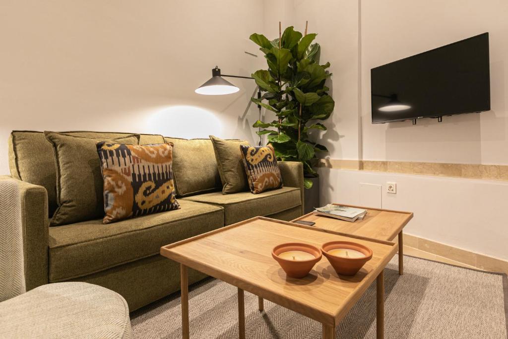 Telewizja i/lub zestaw kina domowego w obiekcie Angeles 6- Giralda Luxury by Valcambre