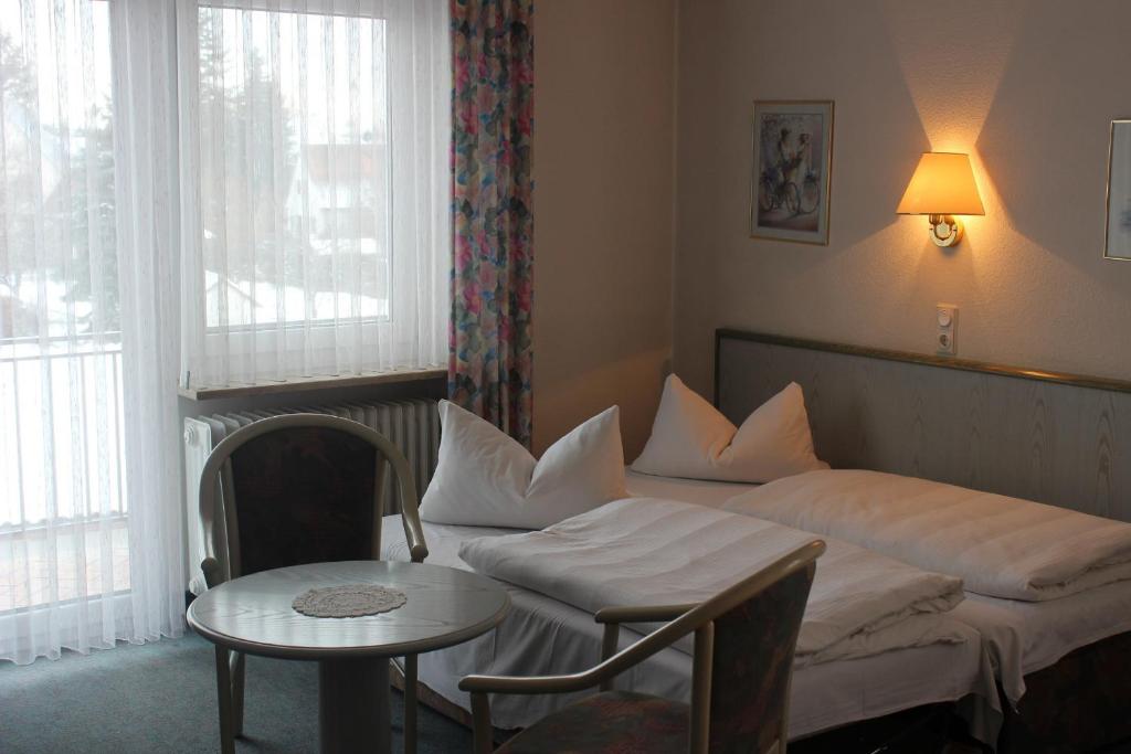 Postel nebo postele na pokoji v ubytování Hotel Gasthof Seehof