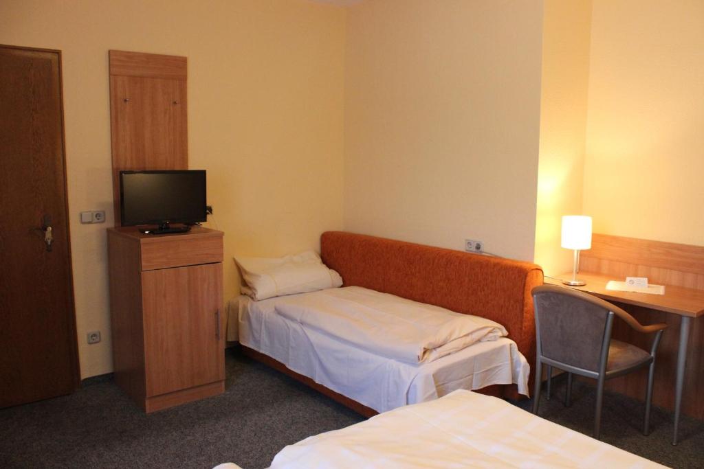 Postel nebo postele na pokoji v ubytování Hotel Gasthof Seehof