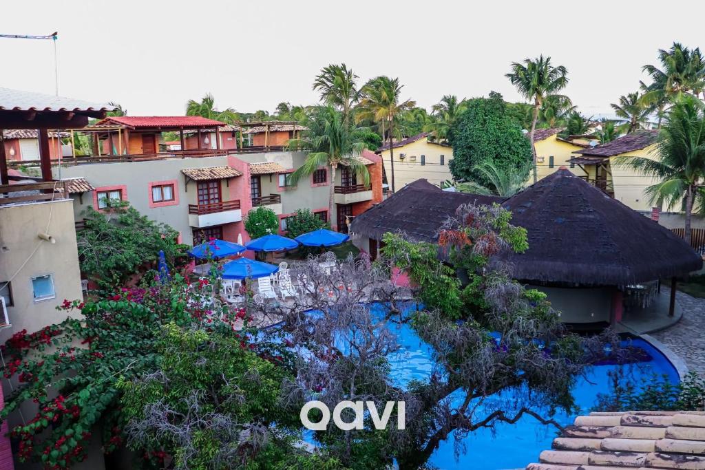 uma vista aérea de um resort com uma piscina em Qavi - Triplex Resort Pipa #Resort19 em Pipa