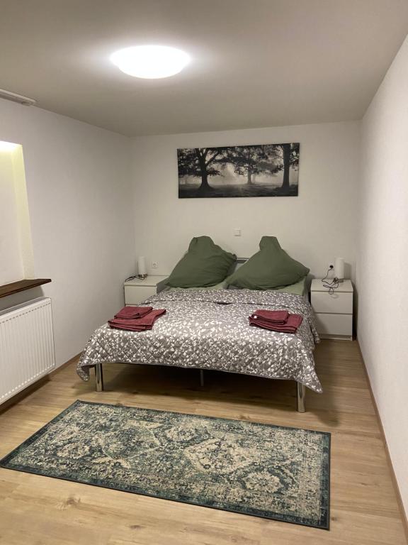 Postel nebo postele na pokoji v ubytování Gemütliche Ferienwohnung EVIELINE in Todtnau