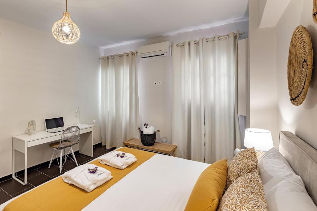 Voodi või voodid majutusasutuse Grammata Suites toas