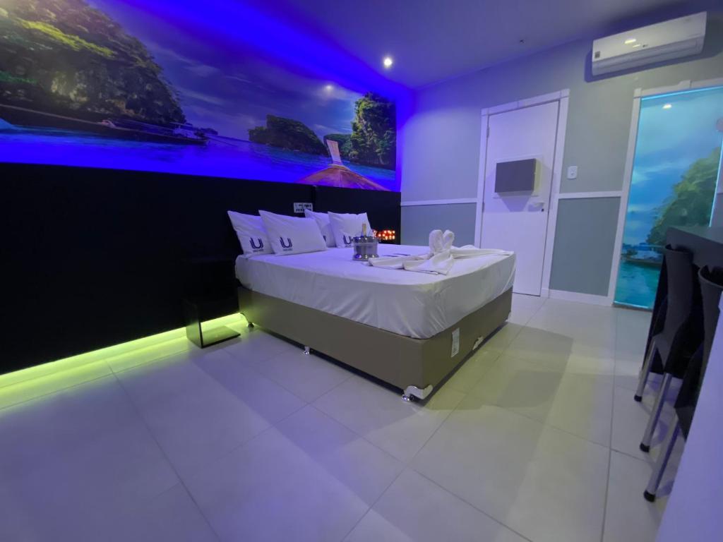 Postel nebo postele na pokoji v ubytování Único Motel Faria Lima
