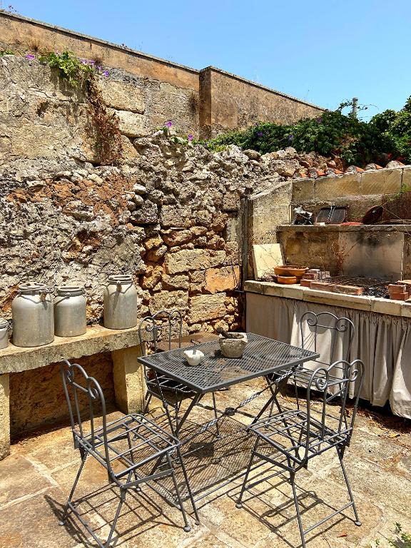 Patio nebo venkovní prostory v ubytování Palazzo Sabella Tommasi