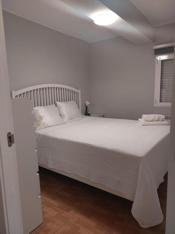 Postel nebo postele na pokoji v ubytování Apartamento Zaragoza Plaza Europa