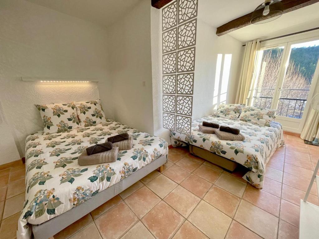 Ένα ή περισσότερα κρεβάτια σε δωμάτιο στο Côté Place