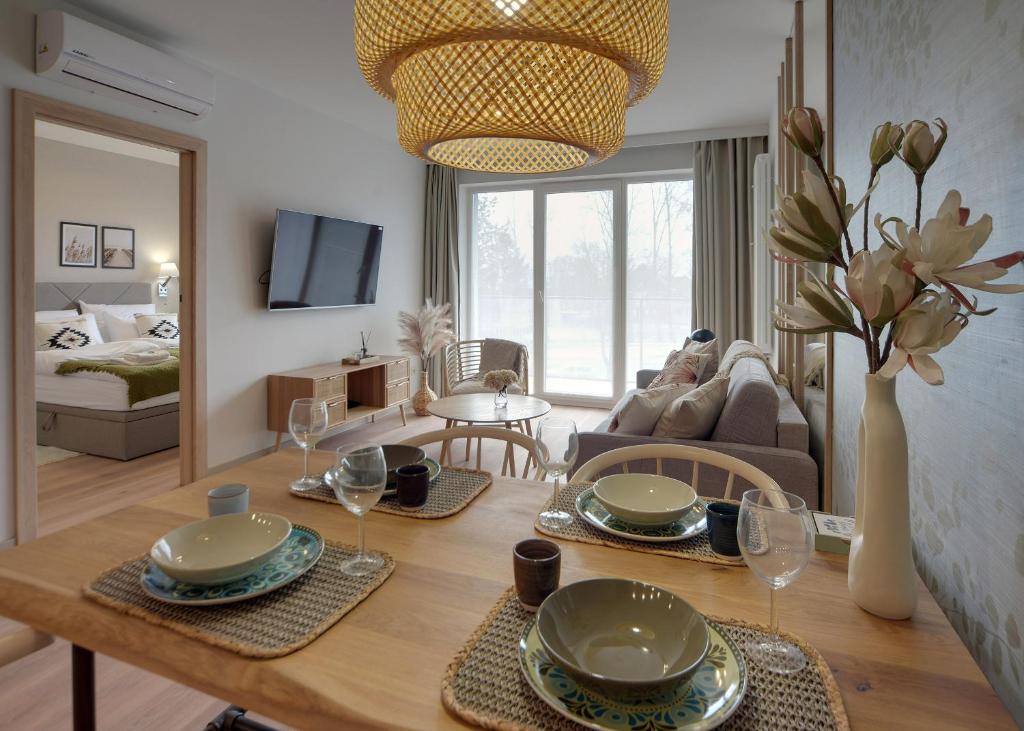 Televízia a/alebo spoločenská miestnosť v ubytovaní Apartament Dziwnów Sagaris Spa