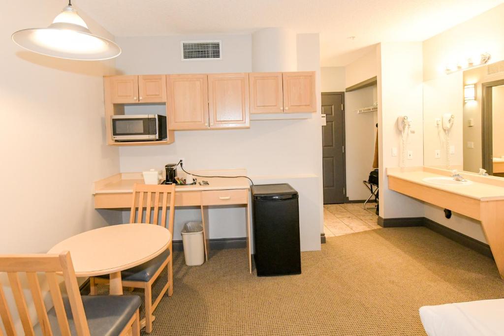 Kuchyň nebo kuchyňský kout v ubytování Prime Hotel