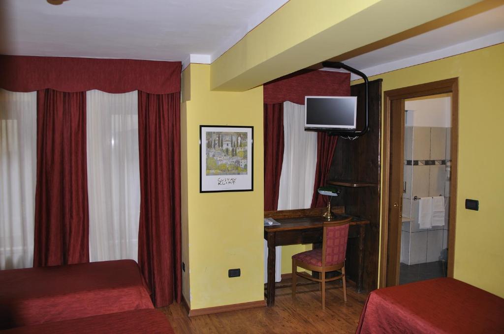 TV a/nebo společenská místnost v ubytování Hotel Sud Ovest