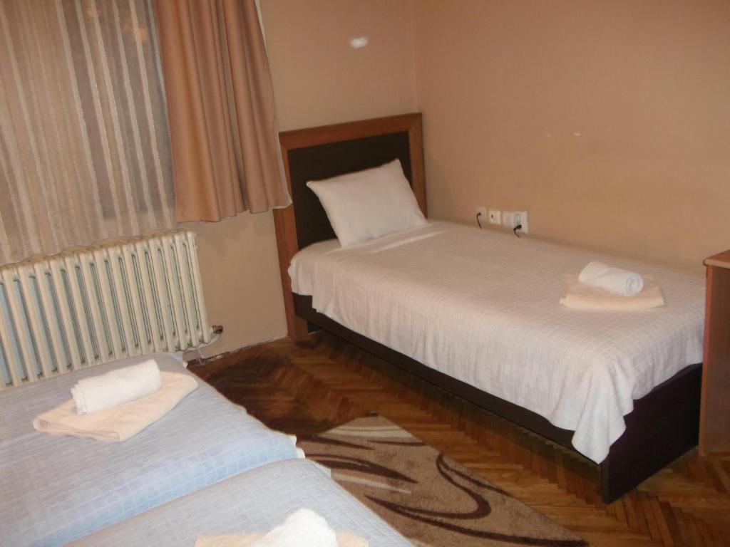 Postel nebo postele na pokoji v ubytování Vila Silia