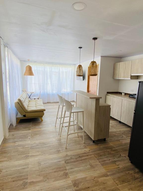 Kuchyň nebo kuchyňský kout v ubytování Apartamentos GreenUP