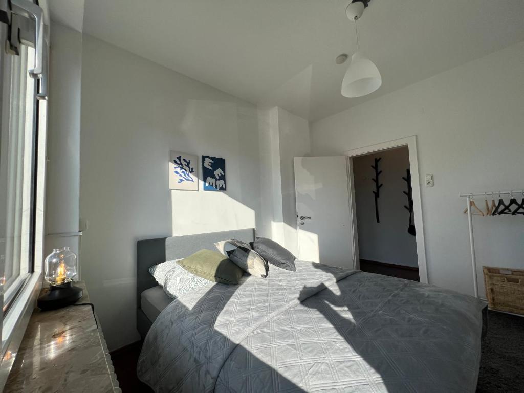 Postel nebo postele na pokoji v ubytování Zentrale Apartments im Herzen vom Bremerhaven