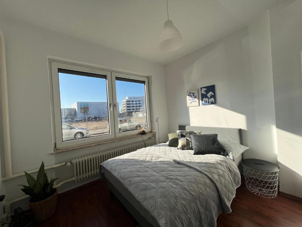 Postel nebo postele na pokoji v ubytování Zentrale Apartments im Herzen vom Bremerhaven