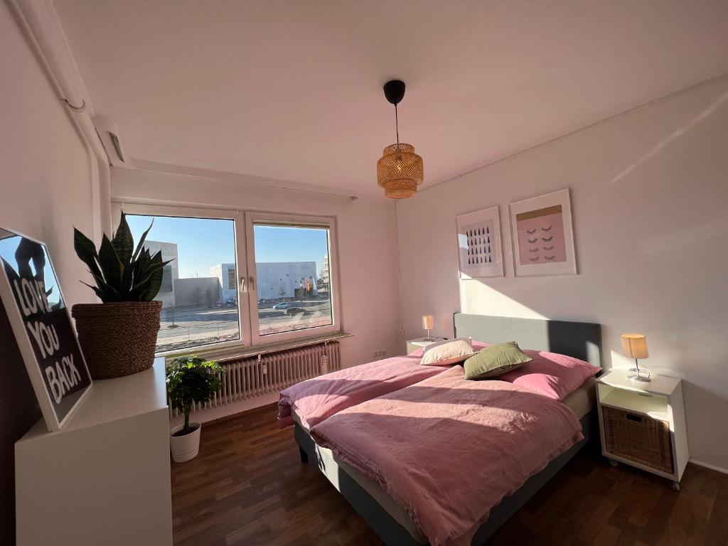 Postel nebo postele na pokoji v ubytování Zentrale Apartments im Herzen vom Bremerhaven