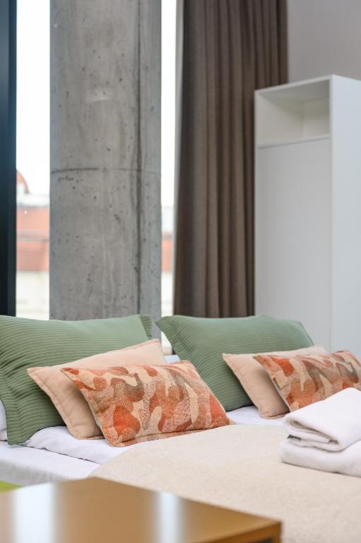 Posteľ alebo postele v izbe v ubytovaní Rich Sopot by OneApartments