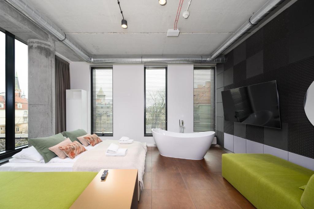 Posteľ alebo postele v izbe v ubytovaní Rich Sopot by OneApartments