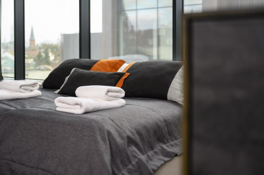 Posteľ alebo postele v izbe v ubytovaní Rich Sopot by OneApartments