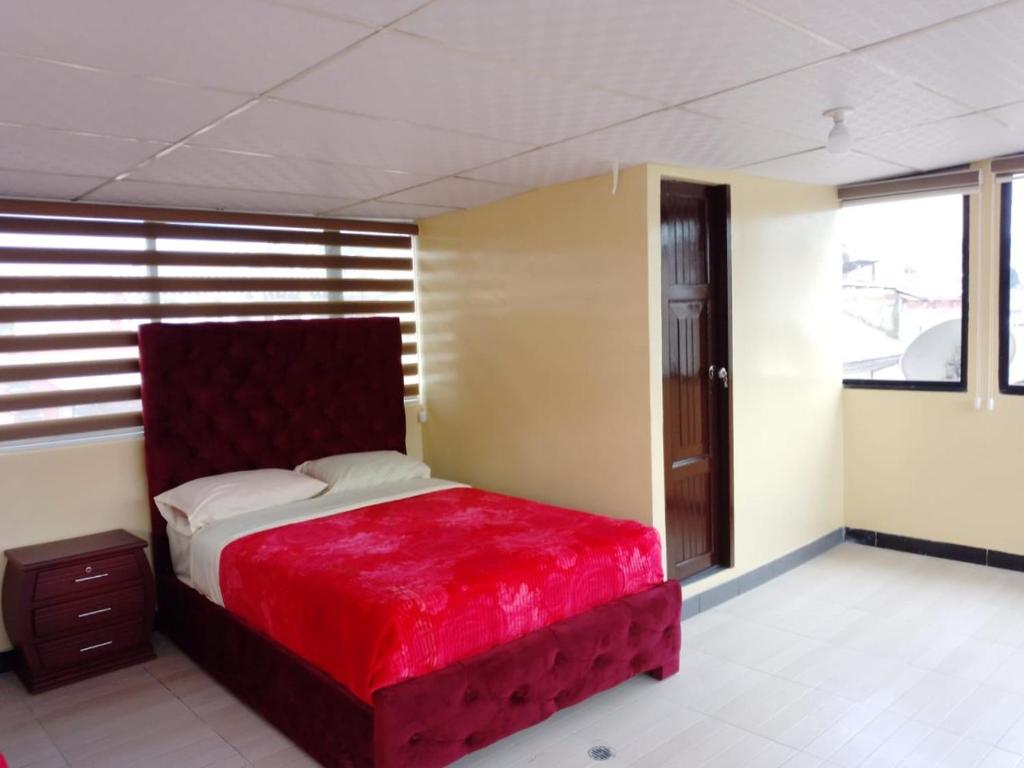 Postel nebo postele na pokoji v ubytování Hostal Mediodía MATRIZ