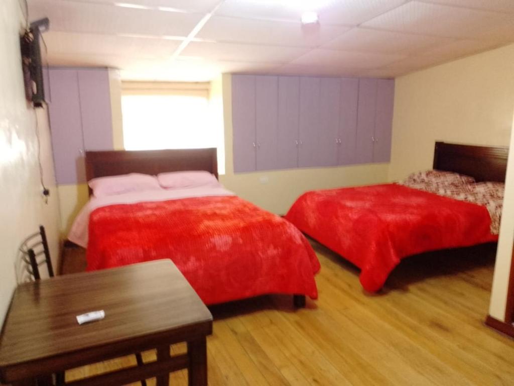 Postel nebo postele na pokoji v ubytování Hostal Mediodía MATRIZ