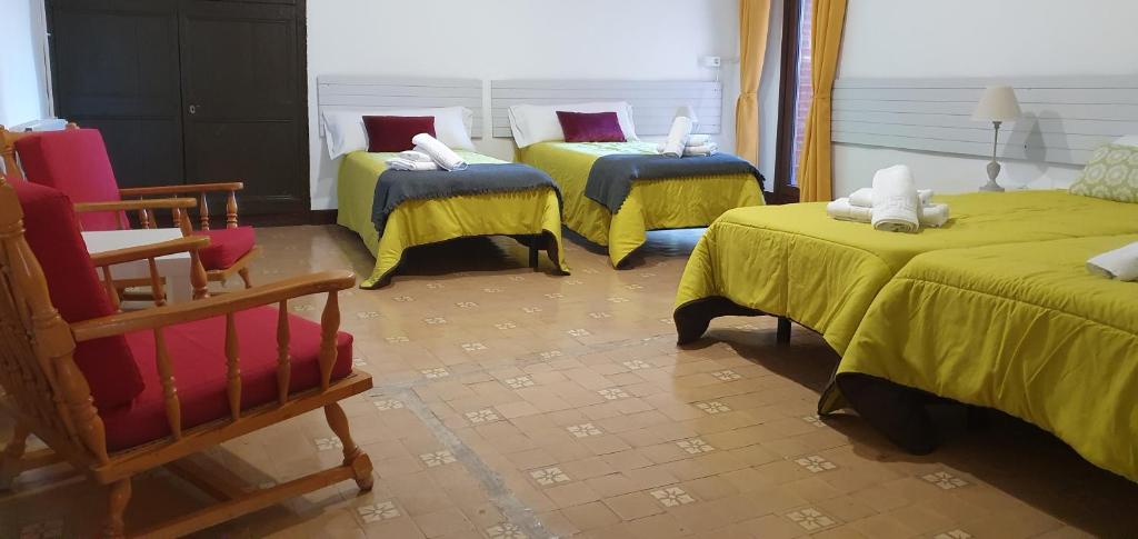 Postel nebo postele na pokoji v ubytování espai Abadia