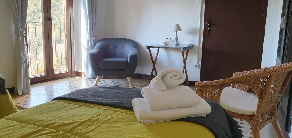 Postel nebo postele na pokoji v ubytování espai Abadia